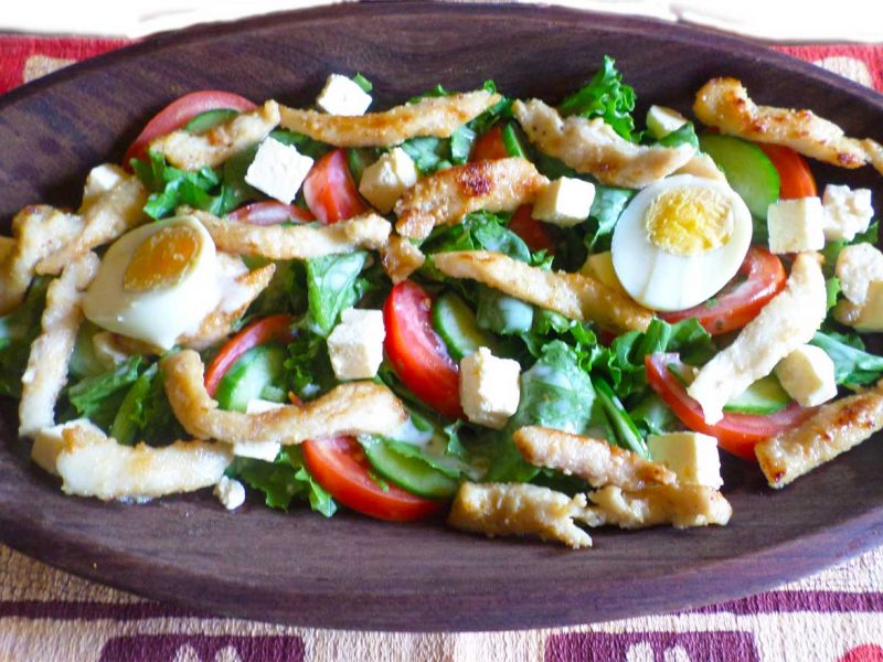 colorful salad with meat and eggs